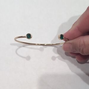 Elegant Gold Bracelet with Green Accents